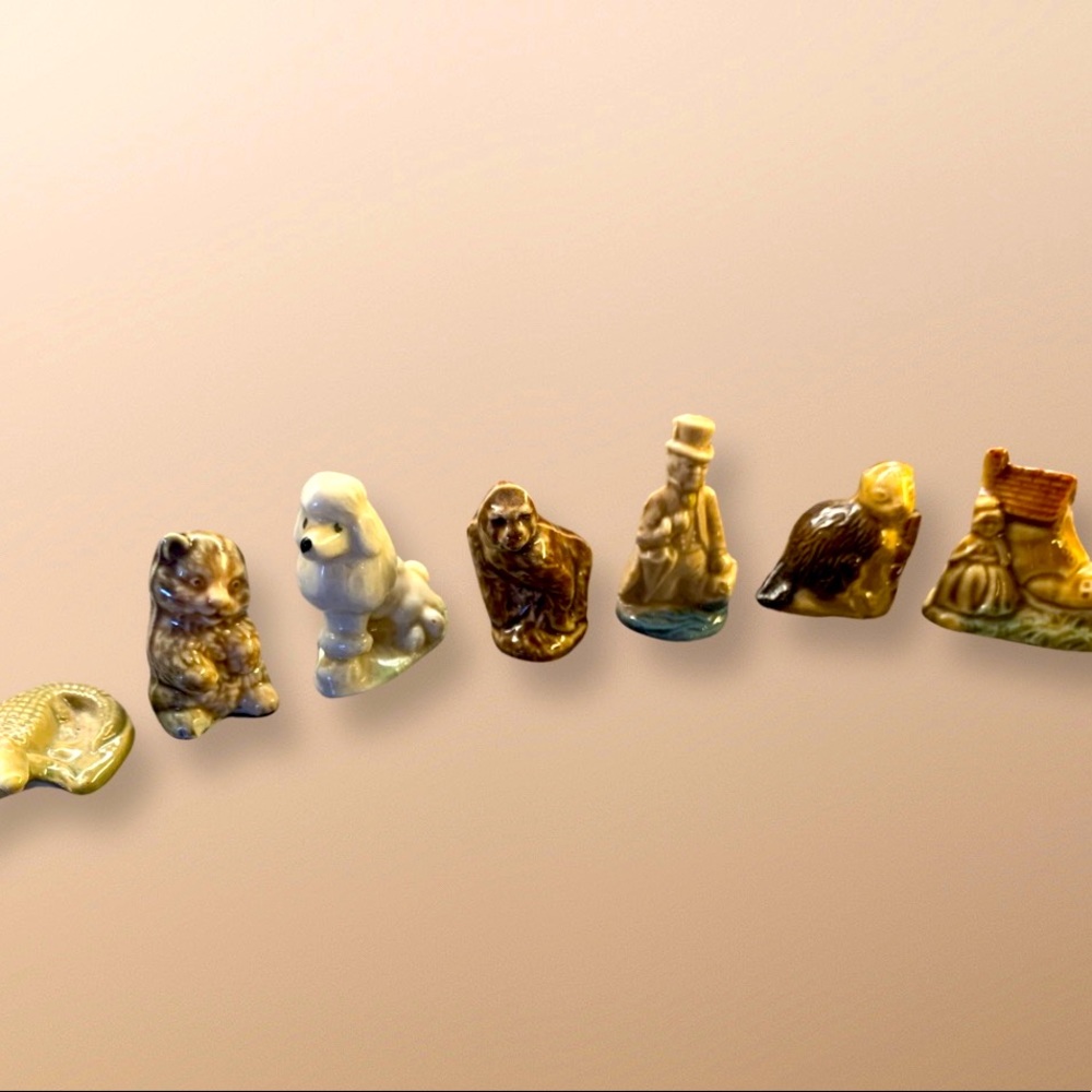 Antique collectable Wade Tea figurines.
